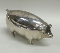 A large Edwardian silver pin holder in the form of