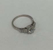 A good diamond single stone ring in Art Deco mount