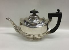 A silver half fluted bachelor's teapot. Birmingham