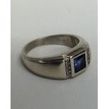 A diamond mounted ring with large central stone in