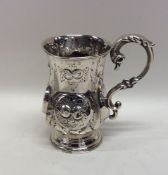 A small Victorian silver chased christening cup de