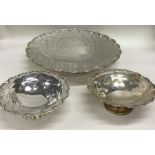 A heavy set of three graduated silver sweet dishes