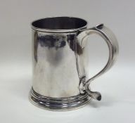 A rare Queen Anne tapering silver mug on spreading