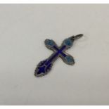 An unusual Russian enamelled silver cross with loo