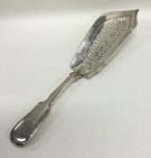 A Georgian silver fiddle and thread fish slice wit