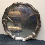 A large Continental silver salver with reeded bord