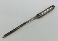 A Georgian silver gilt marrow scoop. London. Appro