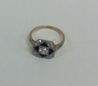 An attractive square diamond and blue enamelled cl