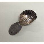 A Georgian silver bright cut caddy spoon with flut