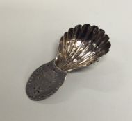 A Georgian silver bright cut caddy spoon with flut