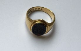 A gent’s 18 carat gold signet ring. Approx. 7 gram