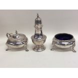 A three piece Edwardian silver cruet set. London.