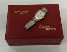 LONGINES: A cased gold and steel Ferrari wristwatc