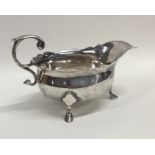 A good Georgian silver sauce boat with card cut ri