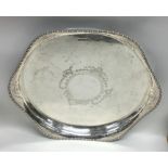 An attractive circular Edwardian silver tea tray w