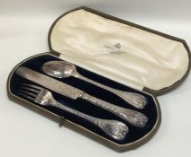 An attractively cased silver three piece christeni