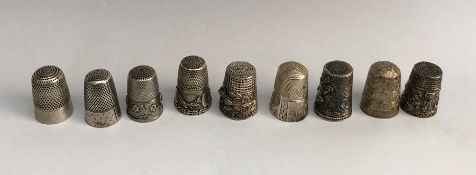 A heavy group of silver and other thimbles. Total