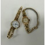Two 9 carat gold mounted wristwatches. Approx. 29
