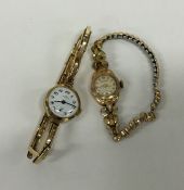 Two 9 carat gold mounted wristwatches. Approx. 29