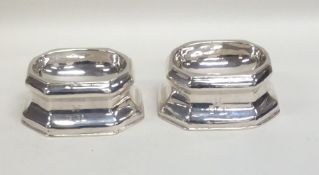 A rare pair of George I silver trencher salts of t