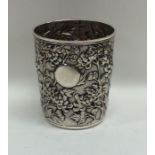 A good tapering Chinese silver beaker profusely de