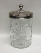 A silver and cut glass biscuit barrel. Birmingham.