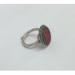 An unusual Islamic silver signet ring mounted with