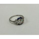 An attractive French platinum sapphire and diamond