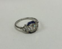 An attractive French platinum sapphire and diamond