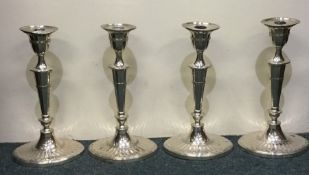 A good set of four silver Adams' style candlestick