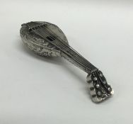 A novelty miniature silver mandolin embossed with