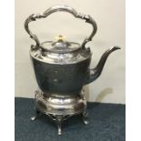 An old BM kettle on stand. Est. £20 - £30.