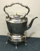 An old BM kettle on stand. Est. £20 - £30.