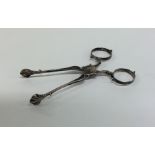 A pair of Georgian silver sugar scissors with flut