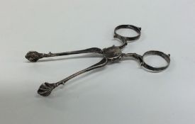 A pair of Georgian silver sugar scissors with flut