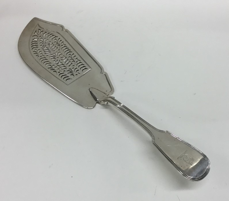 A heavy silver fiddle and thread fish slice with c