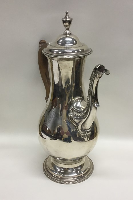 A Georgian silver coffee pot of baluster form and - Image 2 of 3