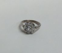 A good Edwardian diamond circular cluster ring. Ap