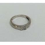A diamond four stone princess cut ring. Approx. 3