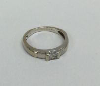 A diamond four stone princess cut ring. Approx. 3