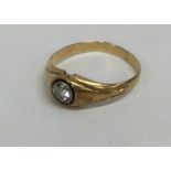 A good diamond single stone gypsy set ring set in