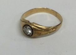 A good diamond single stone gypsy set ring set in