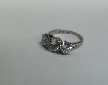 A important diamond three stone ring attractively