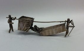 A novelty miniature silver rickshaw. Approx. 48 gr