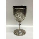 A heavy silver Continental engraved goblet. Approx
