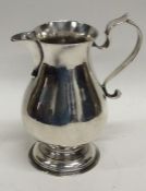 A good Georgian silver sparrow beak cream jug with