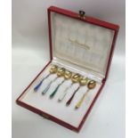 A set of six Continental silver gilt and enamel te