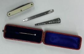 A silver mounted knife together with a pearl stick