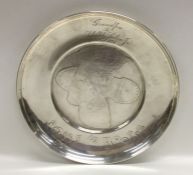 A circular American silver dish entitled, 'Puss In