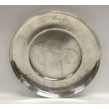 A circular American silver dish entitled, 'Puss In